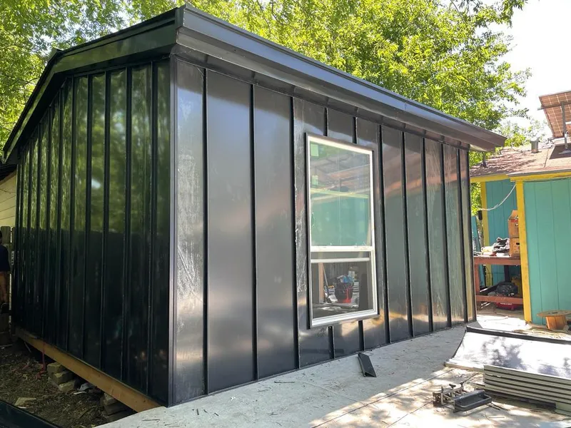 Black standing seam metal wall panels for Metal Roof Installation in La Habra