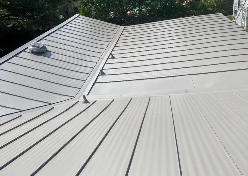 Solar attic fan installed on a metal roof for Roof Ventilation in La Habra
